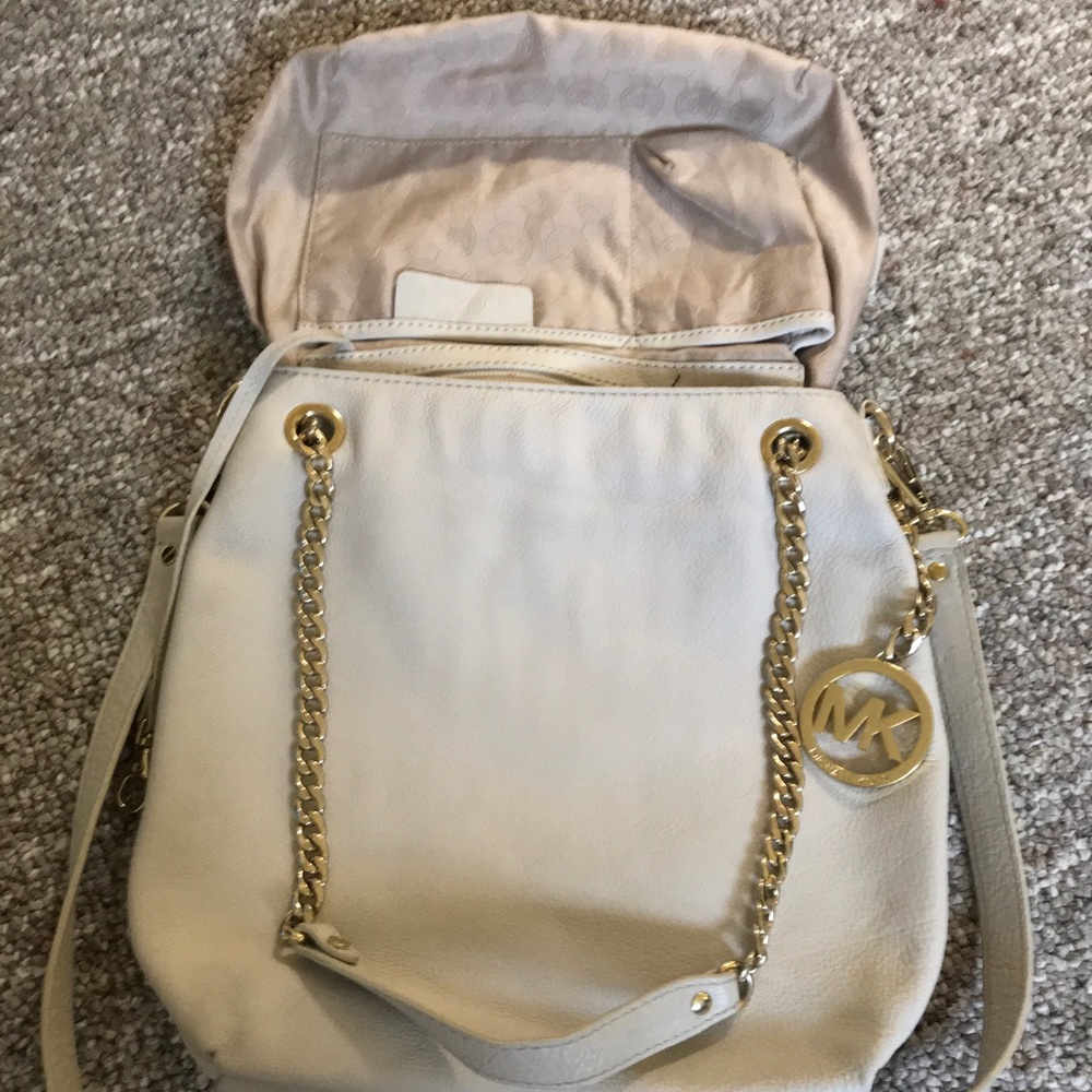 Small MK purse height 11 length 9 width 2